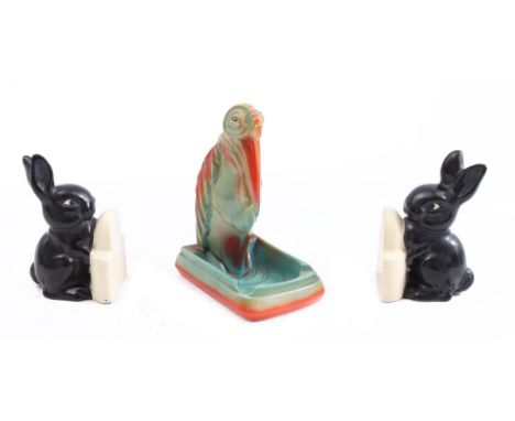 Mosa Maastricht earthenware ashtray with decor of a marabou stork, 18 cm high and 2 Goebel earthenware bookends in the shape 