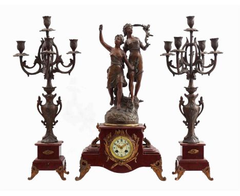 3-piece clock set consisting of a mantel clock, marble case, zamak statue of two women on top, 66 cm high with a 5-light cand