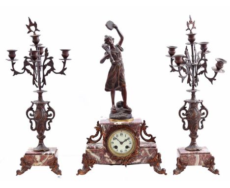 Marble mantel clock with zamak statue of a woman with tambourine on top, 53 cm high, 31.5 cm wide, and 2 5-light candlesticks