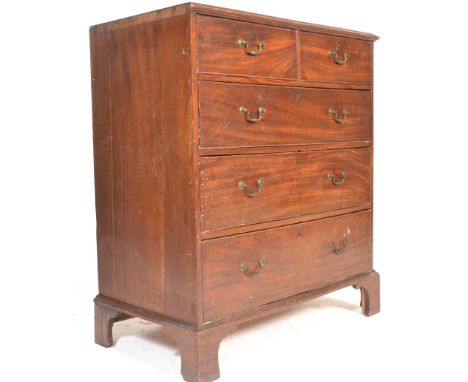 A 19th Century Georgian mahogany chest of drawers, two short drawers over three long fitted with brass drop handles raised on