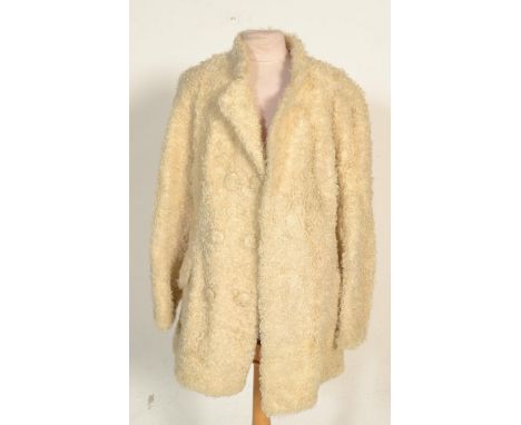A group of eight vintage 20th Century fur coats / jackets of differing styles and various sizes to include light and dark bro