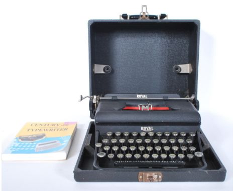 A vintage early 20th Century Royal Portable typewriter in fitted carry case, glass keys with Royal logo in silver lettering t