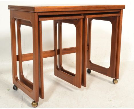 A 20th Century retro teak wood nest of three tables by Macintosh and Co side consisting of one long table with two short. The