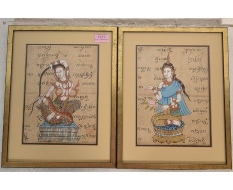 Two 20th century Thai paintings on manuscript paper to include the Earth Goddess and the good Luck Goddess both depicted pose