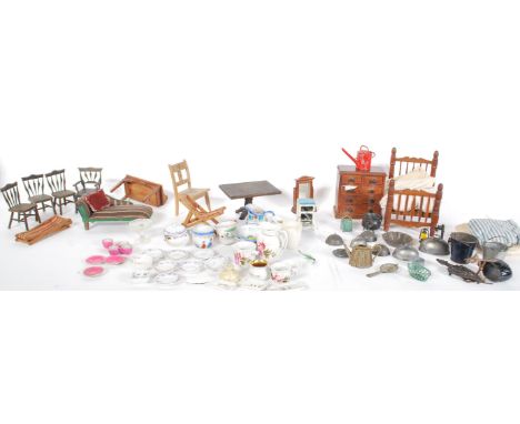 A collection of doll's house furniture and ornaments dating from the 19th Century onwards to include bed, chest of drawers, s