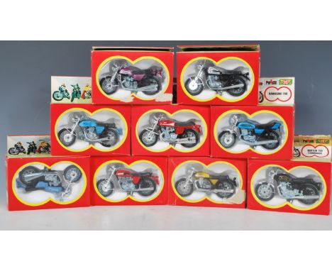 A group of nine 1:24 scale model bikes by Polistil club 33 to include models Norton 750 Cammando, Guzzi V7 Sport 750, Triumph