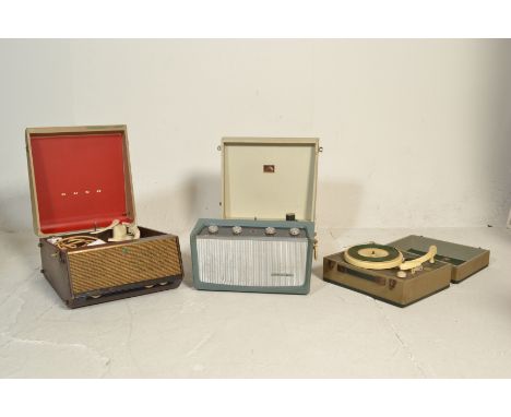 A selection of vintage portable record players to include a HMV cased record player with four chromed dials to the case, a Bu