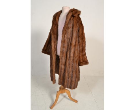 A group of eight vintage 20th Century ladies fur coats / jackets of differing styles and various sizes to include a dark and 