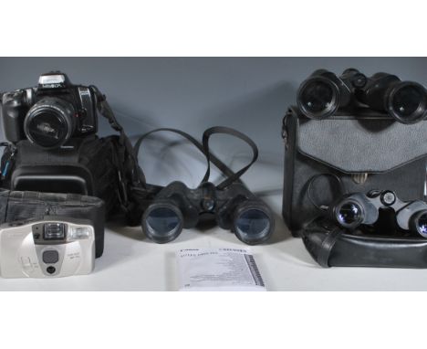 A small group of cameras and binoculars to include makes and models from Minolta Dynax 300si having a Minolta AF Zoom 1.1m / 