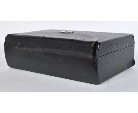 A 19th Century WIlliam Lund of London leather bound travelling writing slope having a hinged lid with brass lock to front, op