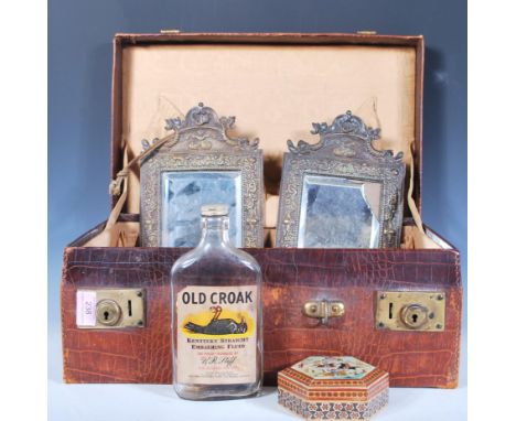 A vintage 20th Century crocodile style leather vanity suitcase together with a pair of 19th Century cast metal easel mirrors 