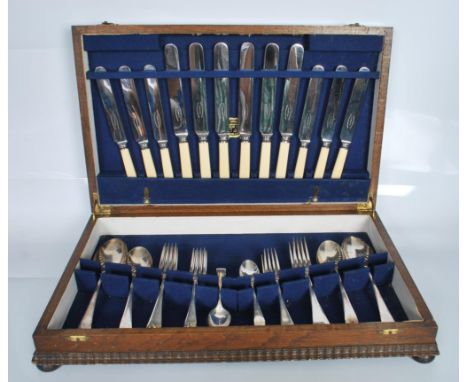 A 20th Century G Butler and Co stainless steel and silver plated cutlery service having ivorine handled knives, and cutlery f