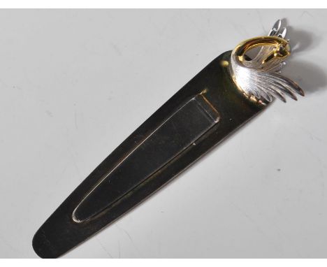 A silver hallmarked bookmark having a gilt swan finial with outstretched wings. Marked with import hallmarks for 1986. Weight