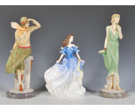 A group of three Royal Doulton&nbsp;ceramic figurines to include figure of the year 1998 Rebecca HN4041. Together with two fi
