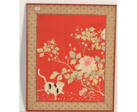 An early 20th century Burmese needlepoint on silk tapestry with cat and peony tree set on red silk ground having beautiful gi
