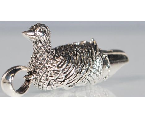 Hunting interest- A sterling silver whistle pendant in the form of a duck. Stamped 925 sterling. Weighs 15.6g. Measures 4cm l