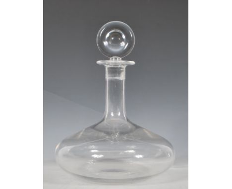 A 20th Century Baccarat crystal red wine decanter having a round stopper atop, waisted neck and bulbous body. Marks to base o