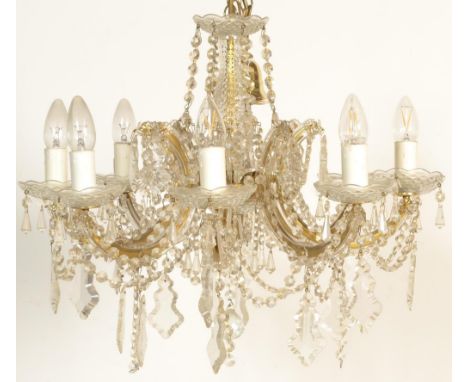 A vintage 20th Century six point electric gilt brass ceiling&nbsp;chandelier - electrolier light fitting, adorned with cut gl