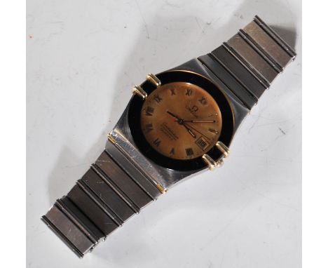 A vintage Omega Constellation Chronometer Quartz wrist watch having a gilt dial with roman numerals to the chapter ring and d