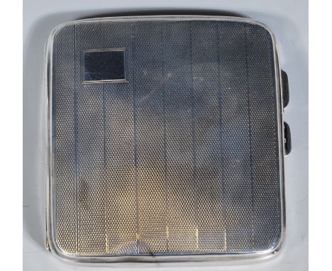 A 20th Century Art Deco Joseph Gloster silver cigarette case having engine turned decoration to the exterior and gilt interio