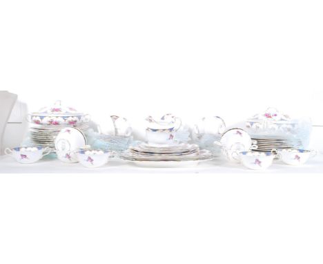 An extensive bone China dinner and tea service by Aynsley, the service consisting of lidded tureens, various plates, cups, sa