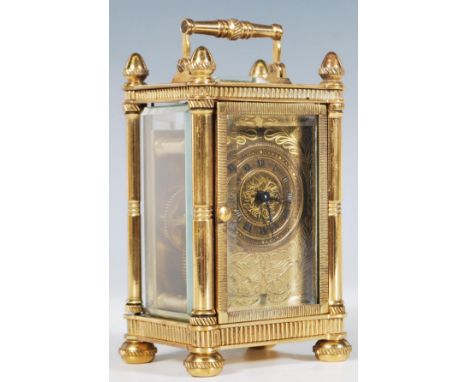 A vintage brass miniature Carriage Clock of five-glass form, possibly French, brass chase decorated face&nbsp;intricately eng