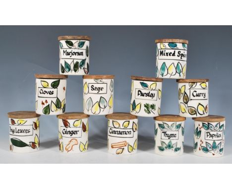 Geoffrey Maund - A selection of vintage ceramic spice jars having hand painted name labels decorated with hand painted foliat