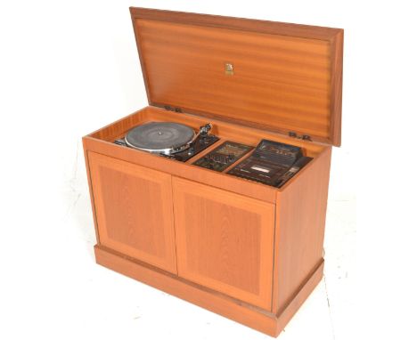 Dynatron - A retro vintage teak wood cased record player / stereo gram by Dynatron model no MC 1710 CT. The hinged top reveal