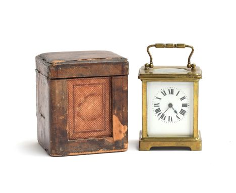 An early 20th century French brass carriage clock, bevelled glass panels, enamel dial with Roman numerals, with key, Japy Fre