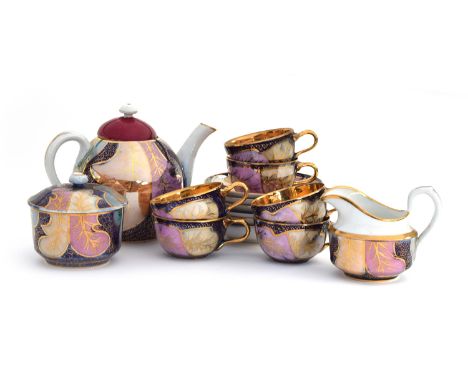 A late 19th/early 20th century Russian Kuznetsov tea set, 15 pieces, with gilt leaf design on a cobalt blue ground, comprisin
