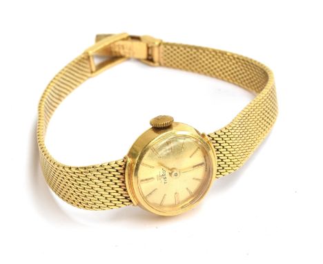 An 18ct gold Tissot ladies wrist watch with gold dial, baton numerals and woven strap, clasp stamped 'Tissot 750 99 VA', diam