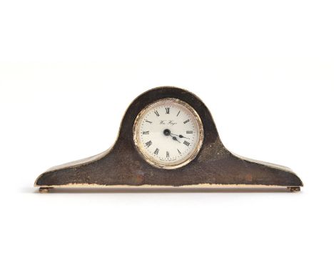 A silver desk clock by William Hayes, c.1989, 17cm wide, 6.4cm high 