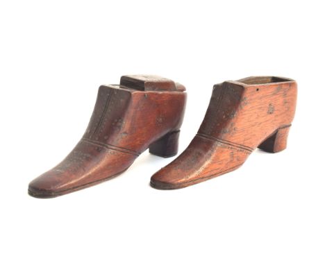 A treen shoe snuff box with nail decoration, and vacant name tablet to pin hinged cover, 12cm long (chipped); together with o