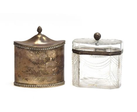 A silver tea caddy by Haseler Brothers, London 1912, pointed oval form with gadrooned borders, 8.6oz, together with a similar