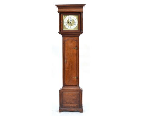 A George III oak longcase clock by Joseph Atkinson, the pediment above a square door to the hood flanked by columns above a l