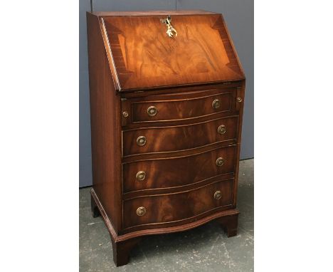 A walnut bureau with key, fall front over four drawers, on bracket feet, 53.5cmW 