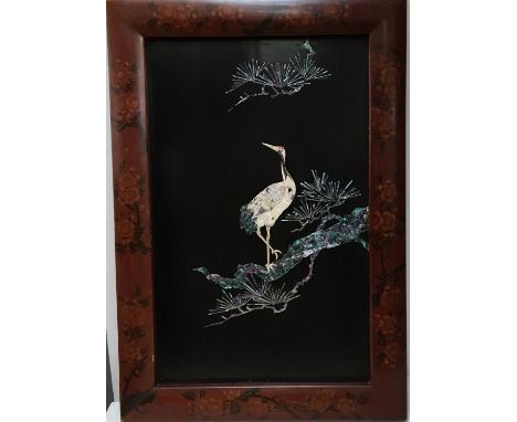 A pair of Japanese mother of pearl inlaid pictures depicting cranes amongst cherry blossom, each 27.5x44cm, within lacquered 