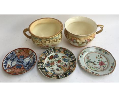 Three Oriental plates, one Chinese famille verte with character marks to base; together with two chamber pots 