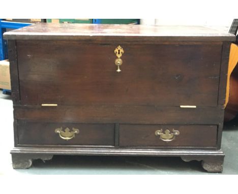 An 18th century mule chest, later converted with hinged fall front and two drawers below, on bracket feet, 92x35x60cmH 