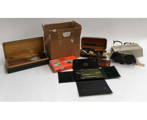 A mixed box to include a Smart2 door phone, Philips electric razor, fire extinguisher brackets, a quantity of door handles; a