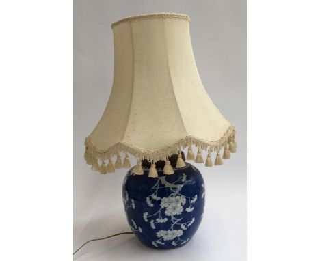 A large Chinese ginger jar, character marks to base, converted into a table lamp 