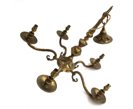 A six arm brass gilt metal chandelier, with acanthus decoration 