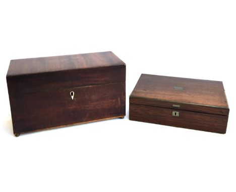 A 19th century mahogany tea caddy on brass bun feet, 27.5cmW; together with a small mahogany box, 24cmW 
