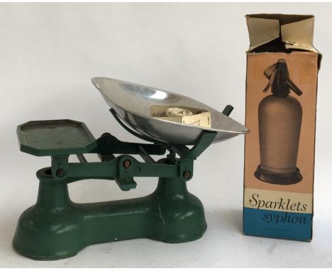 A vintage set of scales, together with a boxed Sparklets soda siphon 