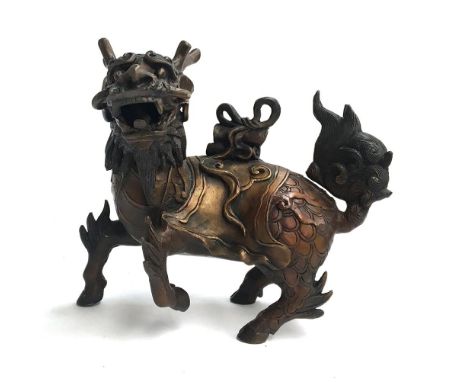 A cast metal statue of a Chinese Qilin, 27cmH 