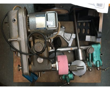 An electric bench grinder/sharpening tool with Parvalux motor
