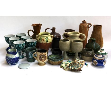 A large lot of studio pottery jugs and vases, together with ceramic goblets with art deco design; ceramic owl plaque etc 