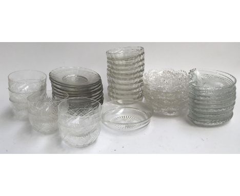 A good mixed lot of glassware to include fingerbowls, small plates, cut glass dishes, demilune side plates etc 