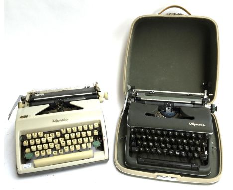 An Olympia De Luxe portable typewriter; together with one other Olympia portable typewriter (2) 