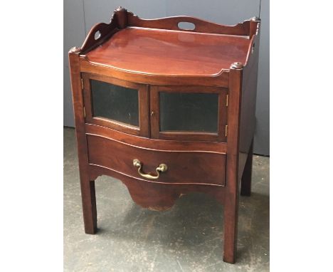 A Regency and later commode/bedside cabinet, converted, three quarter gallery above serpentine front, with two glazed cupboar